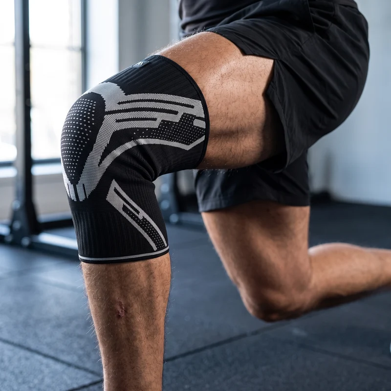 Manchon de Genou Compression à Ressorts Latéraux