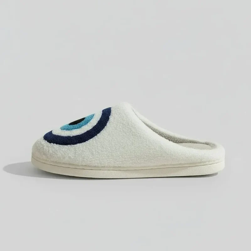 Chaussons moumoute mauvais oeil