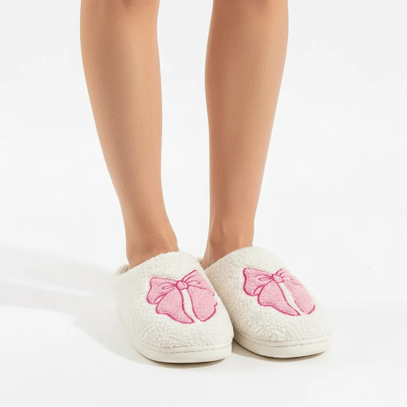 Chaussons moumoute noeud rose